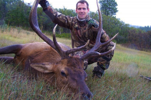 Soap Mesa Outfitter's customer with his bull elk prize.