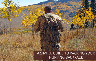 Anonymous man with back turned to camera, showing off hunting backpack.