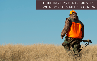 A beginner hunter on a grassy hill in an orange vest holding a rifle, ready to hear some hunting tips.