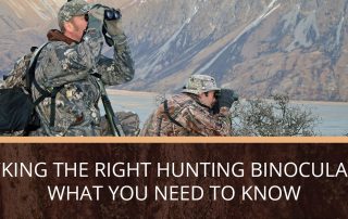 Two hunters sitting on a ridge, using their hunting binoculars to look for elk.