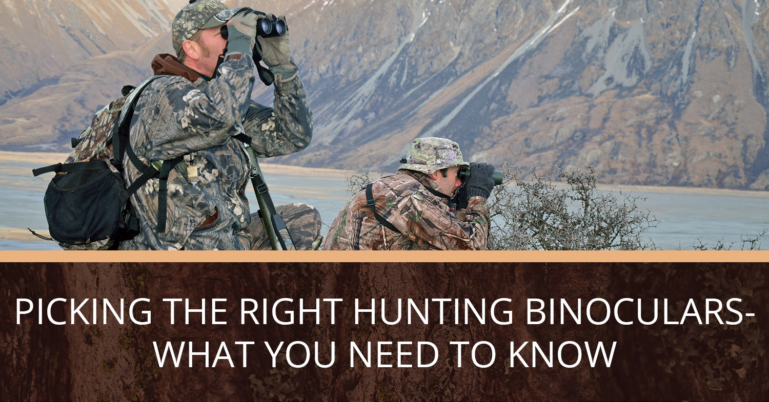 Two hunters sitting on a ridge, using their hunting binoculars to look for elk.