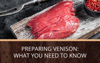 Venison steak sitting on a wood board, ready to be cooked.