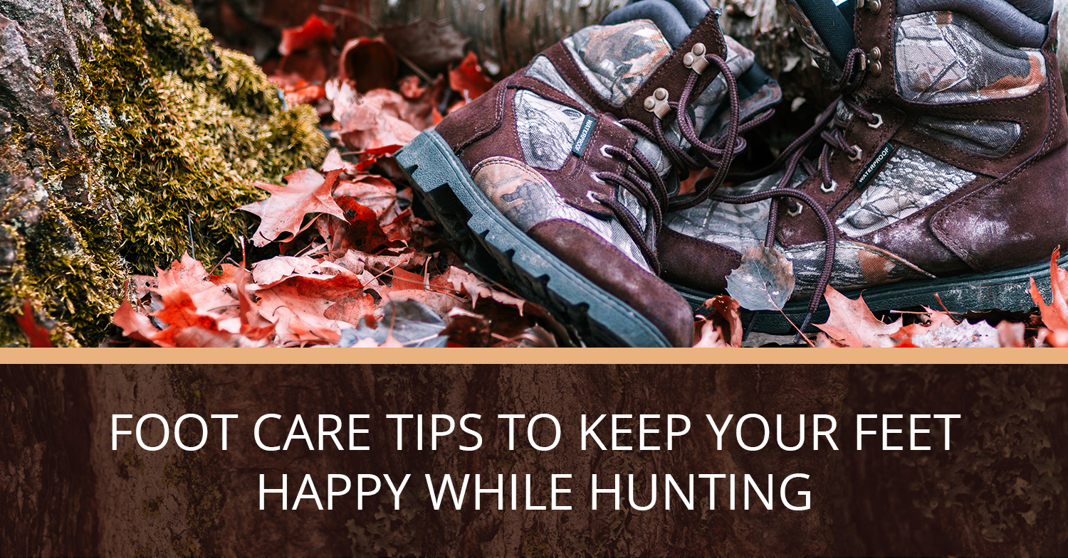 A hunter who has removed their boots to rest their feet - a good example of foot care while hunting.